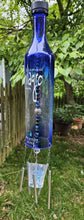 Load image into Gallery viewer, Upcycled Milagro Tequila Bottle Wind Chime
